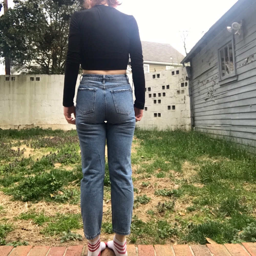 Mom jeans with embellishments on the leg